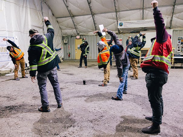 Crew shift safety stretching at our Red Chris project site.