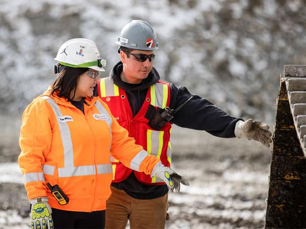 A Tahltan Trainer and a Year 2 Tahltan HEO Program participant conduct an equipment safety inspection.